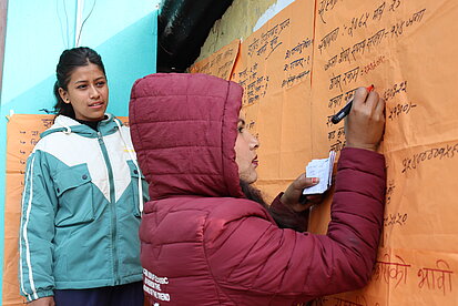 Lors d'une activité d'une coopérative de femmes dans la région Parbat, Népal
